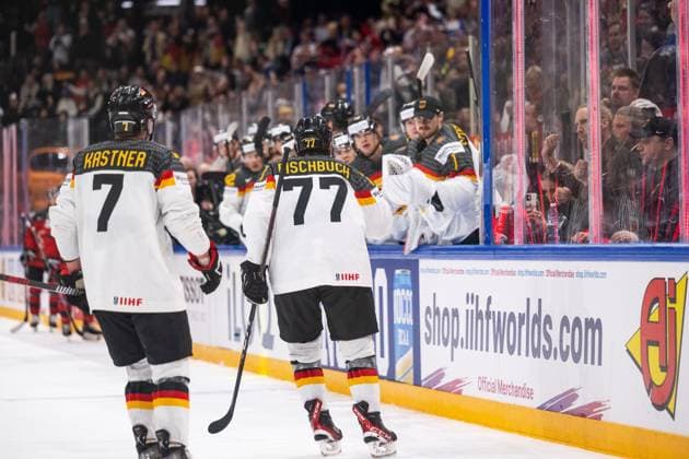 230528 Daniel Fischbuch of Germany celebrates with teammates after scoring 1 2 during the 2023 IIHF Ice Hockey World Championship final game between Canada and Germany on May 28, 2023 in Tampere Photo Joel Marklund BILDBYRAN kod JM JM0489 bbeng ishockey ice hockey ice hockey ishockey vm 2023 ishockey vm vm vm 2023 iihf ice hockey world championship final canada canada germany germany jubel  Copyright: JOELxMARKLUND BB230528JM122