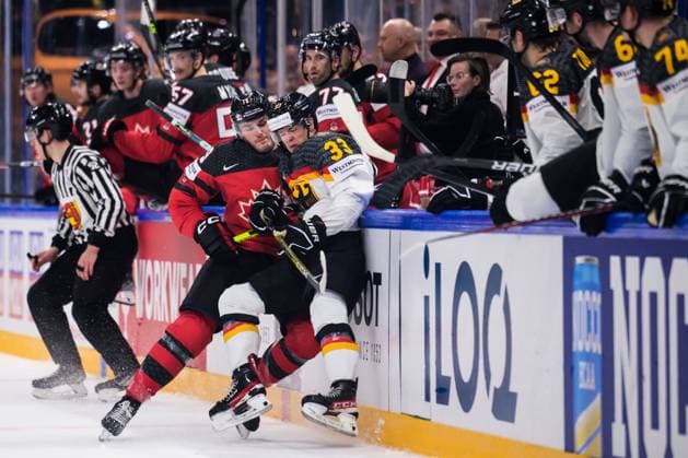 230528 Samuel Blais of Canada tackles John Peterka of Germany during the 2023 IIHF Ice Hockey World Championship final game between Canada and Germany on May 28, 2023 in Tampere Photo Joel Marklund BILDBYRAN kod JM JM0489 bbeng ishockey ice hockey ice hockey vm 2023 ishockey vm vm vm 2023 iihf ice hockey world championship final canada canada germany germany  Copyright: JOELxMARKLUND BB230528JM128