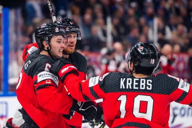 TAMPERE, FINLAND MAY 28 Lawson Crouse of Canada C celebrated by Cody Glass of Canada L and Peyton Krebs of Canada R for his goal during the 2023 IIHF Ice Hockey World Championship Finland Latvia game between Canada and Germany at Nokia Arena on May 28, 2023 in Tampere, Finland Tampere Nokia Arena Finland  Copyright: xJustPictures.ch JarixPestelaccix