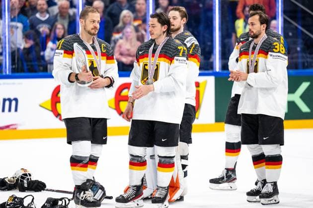 230528 Moritz Müller and Daniel Fischbuch of Germany with the trophy for second place in the 2023 IIHF Ice Hockey World Championship final game between Canada and Germany on May 28, 2023 in Tampere Photo Joel Marklund BILDBYRAN kod JM JM0489 bbeng ishockey ice hockey ice hockey ishockey vm 2023 ishockey vm vm vm 2023 iihf ice hockey world championship final canada canada germany germany  Copyright: JOELxMARKLUND BB230528JM150