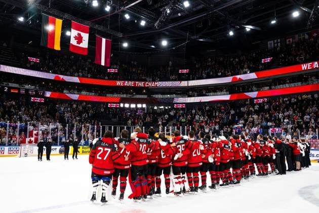 230528 Players of Canada sees the flags of Germany, Canada and Latvia being raised after the 2023 IIHF Ice Hockey World Championship final game between Canada and Germany on May 28, 2023 in Tampere Photo Joel Marklund BILDBYRAN kod JM JM0489 bbeng ishockey ice hockey ishockey vm 2023 ishockey vm vm vm 2023 iihf ice hockey world championship final canada canada germany germany  Copyright: JOELxMARKLUND BB230528JM154