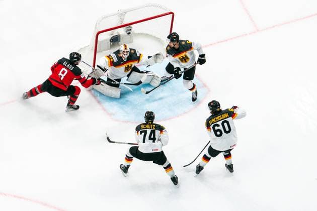 TAMPERE, FINLAND MAY 28 Cody Glass of Canada try to beat Mathias Niederberger of Germany during the 2023 IIHF Ice Hockey World Championship Finland Latvia game between Canada and Germany at Nokia Arena on May 28, 2023 in Tampere, Finland Tampere Nokia Arena Finland  Copyright: xJustPictures.ch JarixPestelaccix
