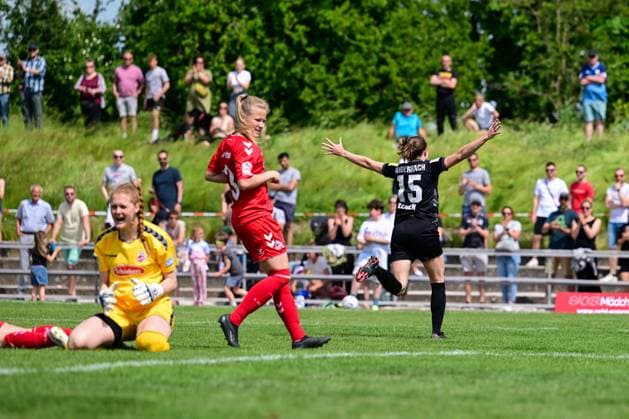 29 05 2023, GER, Soccer, 2 Women Bundesliga 2022 2023, SG 99 Andernach 1 FC Köln U20 Vanessa Zilligen 15 Andernach celebrates the goal while Kölns goalkeeper is annoyed in the foreground Andernach Stadium Rheinland Pfalz Germany.