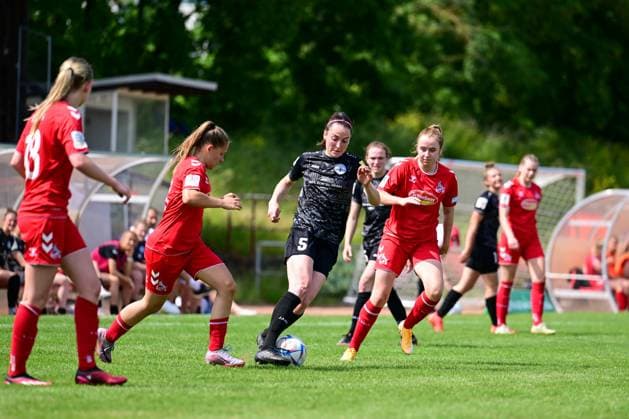 29 05 2023, GER, Soccer, 2 Women Bundesliga 2022 2023, SG 99 Andernach 1 FC Köln U20 Kathrin Schermuly 5 Andernach gets the better of Cologne defense Andernach Stadium Rheinland Pfalz Germany.