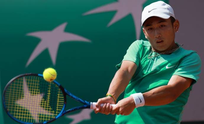 (230529) -- PARIS, May 29, 2023 -- Shang Juncheng of China returns the ball during the men s singles first round match against Juan Pablo Varillas of Peru at the French Open tennis tournament at Roland Garros in Paris, France, May 29, 2023. ) (SP)FRANCE-PARIS-TENNIS-ROLAND GARROS-FRENCH OPEN-MEN S SINGLES GaoxJing 