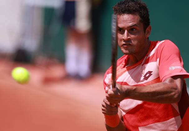 (230529) -- PARIS, May 29, 2023 -- Juan Pablo Varillas of Peru returns the ball during the men s singles first round match against Shang Juncheng of China at the French Open tennis tournament at Roland Garros in Paris, France, May 29, 2023. ) (SP)FRANCE-PARIS-TENNIS-ROLAND GARROS-FRENCH OPEN-MEN S SINGLES GaoxJing 