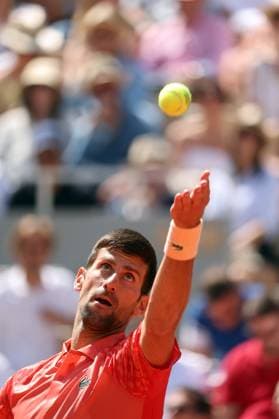 Serbian Novak Djokovic serves to Aleksandar Kovacevic of the US during their first-round match at Roland Garros French Tennis Open in Paris, France, on Monday, May 29, 2023. Djokovic won 6-3, 6-2, 7-6.  PAR20230529515 MAYAxVIDON-WHITE