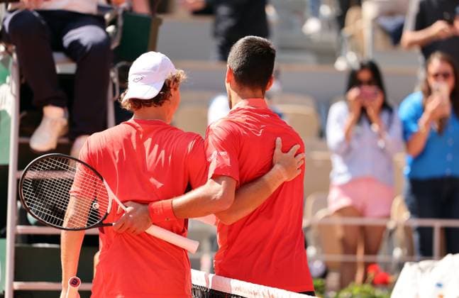 Serbian Novak Djokovic (R) and Aleksandar Kovacevic of the US huis at the end of their first-round match at Roland Garros French Tennis Open in Paris, France, on Monday, May 29, 2023. Djokovic won 6-3, 6-2, 7-6.  PAR20230529531 MAYAxVIDON-WHITE