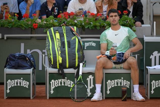 (230530) -- PARIS, May 30, 2023 -- Carlos Alcaraz of Spain reacts during the men s singles first round match between Carlos Alcaraz of Spain and Flavio Cobolli of Italy at the French Open tennis tournament at Roland Garros in Paris, France, on May 29, 2023. (Photo by Xinhua) (SP)FRANCE-PARIS-TENNIS-ROLAND GARROS-FRENCH OPEN-MEN S SINGLES JulienxMattia 