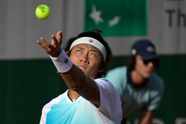 (230530) -- PARIS, May 30, 2023 -- Zhang Zhizhen of China serves during the men s singles first round match against Susan Lajovic of Serbia at the French Open tennis tournament at Roland Garros in Paris, France, May 29, 2023. (Photo by Xinhua) (SP)FRANCE-PARIS-TENNIS-ROLAND GARROS-FRENCH OPEN-MEN S SINGLES JulienxMattia 