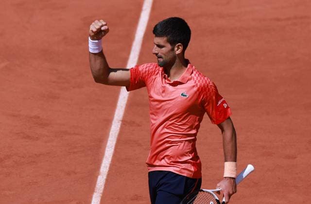 (230530) -- PARIS, May 30, 2023 -- Novak Djokovic of Serbia reacts during the men s singles first round match between Novak Djokovic of Serbia and Aleksandar Kovacevic of the United States at the French Open tennis tournament at Roland Garros in Paris, France, on May 29, 2023. ) (SP)FRANCE-PARIS-TENNIS-ROLAND GARROS-FRENCH OPEN-MEN S SINGLES GaoxJing 