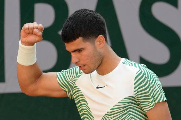 (230530) -- PARIS, May 30, 2023 -- Carlos Alcaraz of Spain celebrates during the men s singles first round match between Carlos Alcaraz of Spain and Flavio Cobolli of Italy at the French Open tennis tournament at Roland Garros in Paris, France, on May 29, 2023. (Photo by Xinhua) (SP)FRANCE-PARIS-TENNIS-ROLAND GARROS-FRENCH OPEN-MEN S SINGLES JulienxMattia 