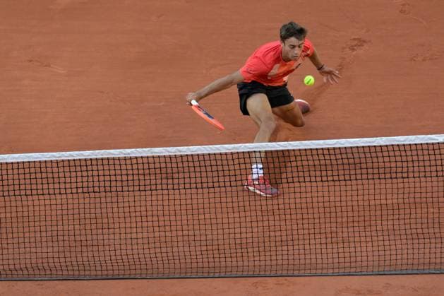 (230530) -- PARIS, May 30, 2023 -- Flavio Cobolli of Italy returns the ball during the men s singles first round match between Carlos Alcaraz of Spain and Flavio Cobolli of Italy at the French Open tennis tournament at Roland Garros in Paris, France, on May 29, 2023. (Photo by Xinhua) (SP)FRANCE-PARIS-TENNIS-ROLAND GARROS-FRENCH OPEN-MEN S SINGLES JulienxMattia 