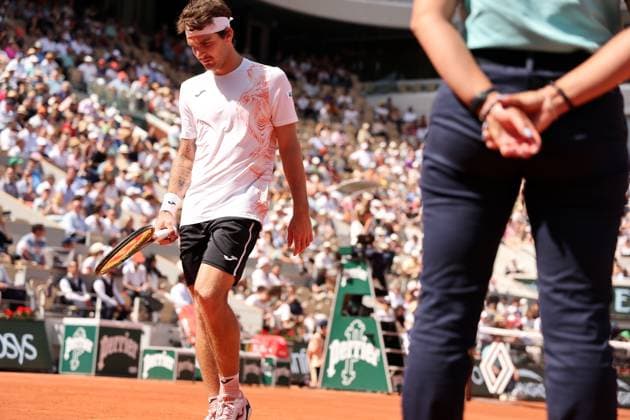 Thiago Seyboth Wild of Brazil returns the ball to world number 2 seeded Daniil Medvedev of Russia during their first-round match at Roland Garros French Tennis Open in Paris, France, on Tuesday, May 30, 2023. Seyboth Wild won 7-6, 6-7, 2-6, 6-3, 6-4.  PAR20230530133 MAYAxVIDON-WHITE