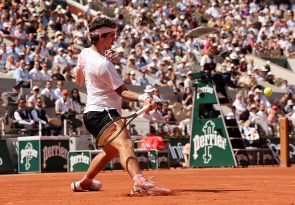 Thiago Seyboth Wild of Brazil returns the ball to world number 2 seeded Daniil Medvedev of Russia during their first-round match at Roland Garros French Tennis Open in Paris, France, on Tuesday, May 30, 2023. Seyboth Wild won 7-6, 6-7, 2-6, 6-3, 6-4.  PAR20230530139 MAYAxVIDON-WHITE