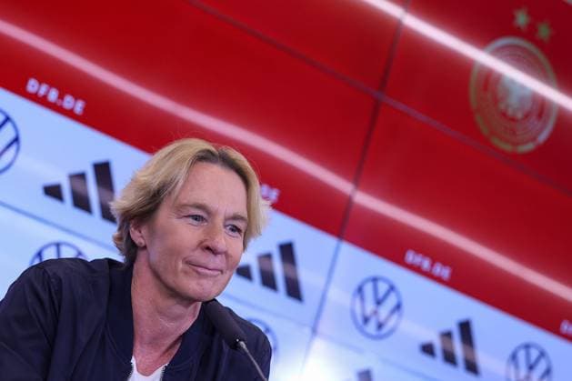 Frankfurt am Main, 31 May 2023, DFB Campus, press conference with national coach Martina Voss Tecklenburg to announce the expanded World Cup squad for the World Cup in Australia and New Zealand 2023 v l , national coach Martina Voss Tecklenburg, in the background DFB Logo Copyright: JoaquimxFerreira