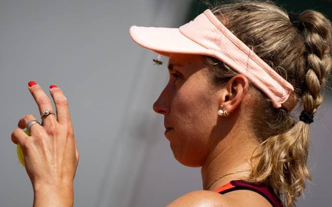Belgian Elise Mertens tries to chase away an insect during a tennis match against Colombian Osorio, in the second round of the women s singles at the Roland Garros French Open tennis tournament in Paris, France, Wednesday 31 May 2023. BENOITxDOPPAGNE  x68204959x
