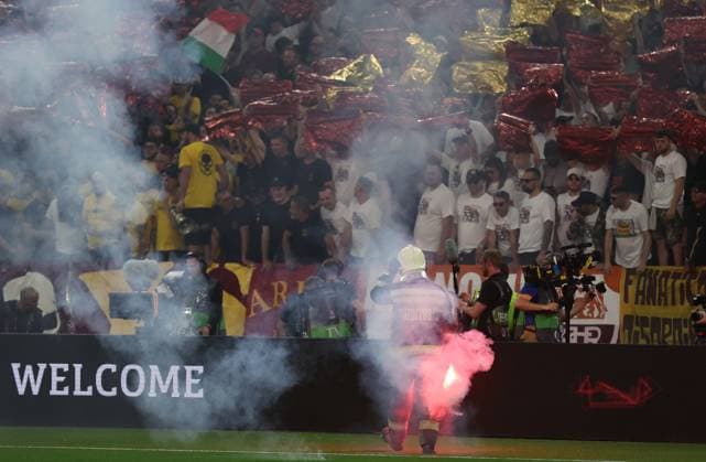 Budapest, Hungary, 31st May 2023. A fire steward removes a flare from the pitch during the UEFA Europa League Final match at Puskas Arena, Budapest. Picture credit should read: David Klein Sportimage EDITORIAL USE ONLY. No use with unauthorised audio, video, data, fixture lists, club league logos or live services. Online in-match use limited to 120 images, no video emulation. No use in betting, games or single club league player publications. SPI-2471-0039