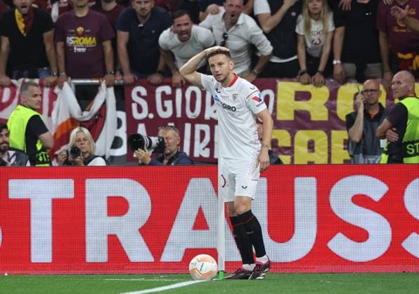 Budapest, Hungary, 31st May 2023. Ivan RakitiÄ‡ of Sevilla claims he was hit on the head while taking a corner kick during the UEFA Europa League Final match at Puskas Arena, Budapest. Picture credit should read: David Klein Sportimage EDITORIAL USE ONLY. No use with unauthorised audio, video, data, fixture lists, club league logos or live services. Online in-match use limited to 120 images, no video emulation. No use in betting, games or single club league player publications. SPI-2471-0041
