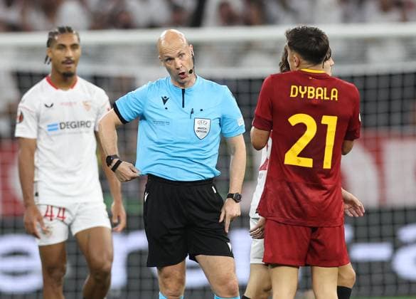 Budapest, Hungary, 31st May 2023. Referee Anthony Taylor indicates a shirt tug to Paulo Dybala of AS Roma during the UEFA Europa League Final match at Puskas Arena, Budapest. Picture credit should read: David Klein Sportimage EDITORIAL USE ONLY. No use with unauthorised audio, video, data, fixture lists, club league logos or live services. Online in-match use limited to 120 images, no video emulation. No use in betting, games or single club league player publications. SPI-2471-0058