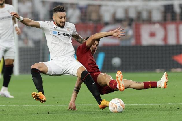 Alex Telles of Sevilla FC and Paulo Dybala of AS Roma during the Europa League Final between Sevilla FC and AS Roma at Puskas Arena stadium in Budapest (Hungary), May 31st, 2023. cesarexpurini