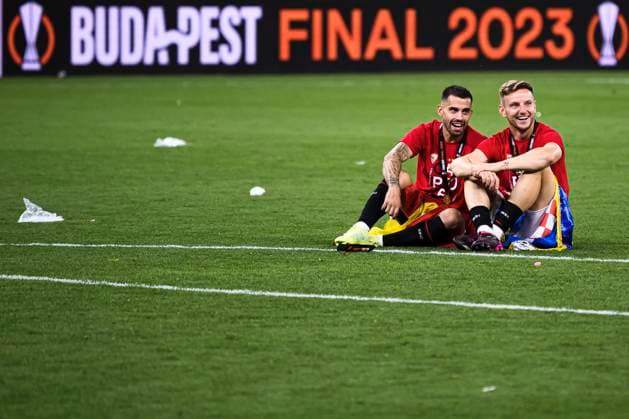 Sevilla FC v AS Roma - UEFA Europa League Suso of Sevilla FC and Ivan Rakitic of Sevilla FC smile at the end of the UEFA Europa League final football match between Sevilla FC and AS Roma. Budapest Hungary Copyright: xNicolòxCampox