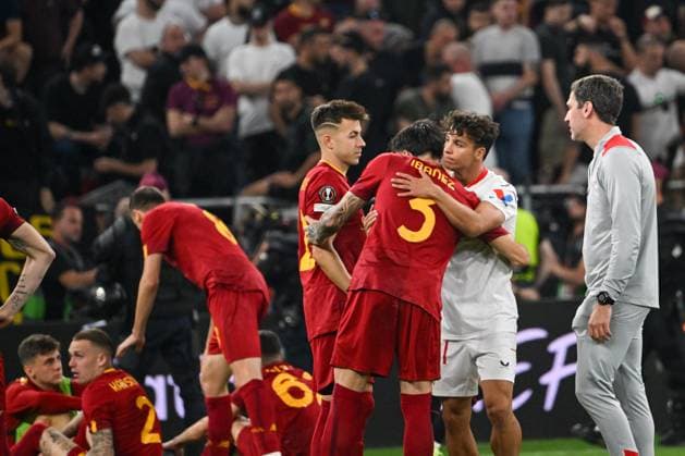 Sevilla FCÃ¢& x80;& x99;s Adnan Januzaj hugs AS RomaÃ¢& x80;& x99;s Roger Ibanez AS RomaÃ¢& x80;& x99;s Roger Ibanez after the Europe League final soccer match between AS Roma vs. Sevilla at the Puskas Arena in Budapest, Hungary, 31st of May 2023 won by Sevilla FC  Copyright: xVinnyxOrlando LiveMediax xipa-agx xLivexMediax 0 IPA_IPA38354810