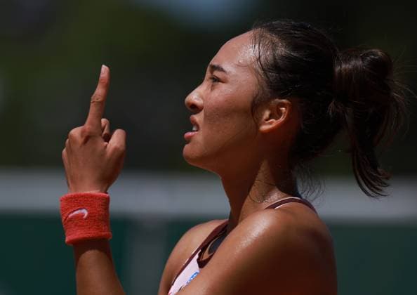 (230601) -- PARIS, June 1, 2023 -- Zheng Qinwen of China reacts during the women s singles second round match between Zheng Qinwen of China and Yulia Putintseva of Kazakhstan at the French Open tennis tournament at Roland Garros in Paris, France, on May 31, 2023. ) (SP)FRANCE-PARIS-TENNIS-ROLAND GARROS-FRENCH OPEN-WOMEN S SINGLES GaoxJing 