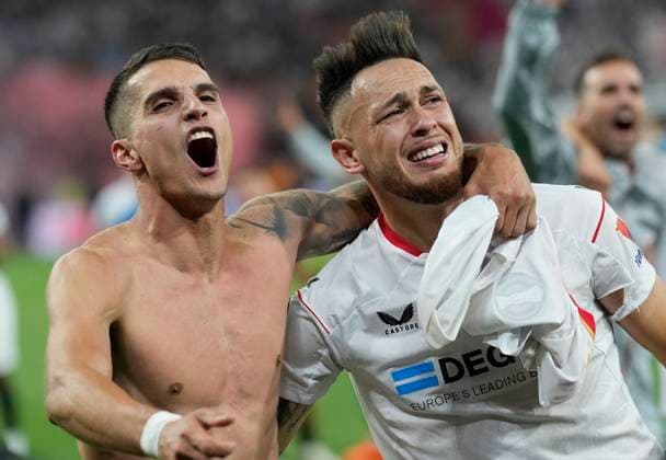 The 2023 UEFA Europa League Final match between Sevilla FC and AS Roma Erik Lamela and Lucas Ocampos celebrate, as Sevilla FC is getting crowned as Europa League champions for a record 7th time after the UEFA Europa League Final match between Sevilla FC and AS Roma at Puskas ArÃ na Stadium on May 31, 2023 in Budapest, Hungary. Budapest Puskas ArÃ na XIV. District Hungary Copyright: xAlexandraxFechetex IMAGO_EuropaLeagueFinal_Sev_v_Rom_AF176A