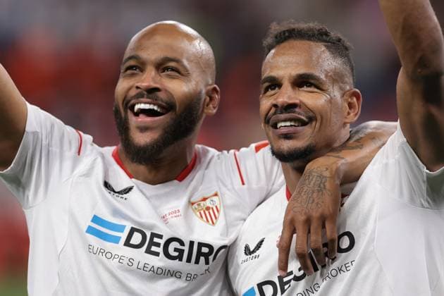 Budapest, Hungary, 31st May 2023. Marcao and Fernando of Sevilla react following the penalty shoot out victory in the UEFA Europa League match at Puskas Arena, Budapest. Picture credit should read: Jonathan Moscrop Sportimage EDITORIAL USE ONLY. No use with unauthorised audio, video, data, fixture lists, club league logos or live services. Online in-match use limited to 120 images, no video emulation. No use in betting, games or single club league player publications. SPI-2476-0064