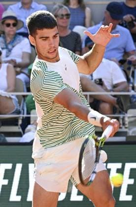 Tennis: French Open World No. 1 Carlos Alcaraz of Spain plays a shot against Taro Daniel of Japan during a second-round men s singles match at the French Open tennis tournament at Roland Garros in Paris on May 31, 2023.  A14AA0001536780P 