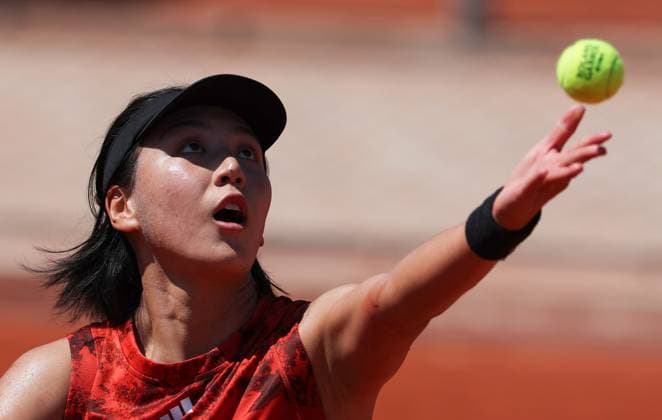 (230601) -- PARIS, June 1, 2023 -- Wang Xinyu of China serves during the women s singles second round match against Rebecca Peterson of Sweden at the French Open tennis tournament at Roland Garros in Paris, France, June 1, 2023. ) (SP)FRANCE-PARIS-TENNIS-ROLAND GARROS-FRENCH OPEN-WOMEN S SINGLES GaoxJing 