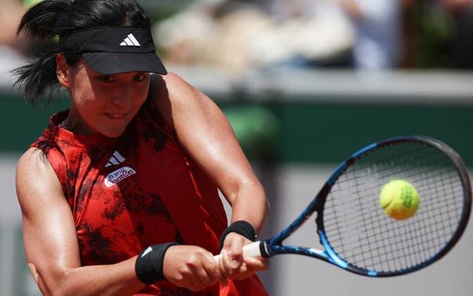 (230601) -- PARIS, June 1, 2023 -- Wang Xinyu of China hits a return during the women s singles second round match against Rebecca Peterson of Sweden at the French Open tennis tournament at Roland Garros in Paris, France, June 1, 2023. ) (SP)FRANCE-PARIS-TENNIS-ROLAND GARROS-FRENCH OPEN-WOMEN S SINGLES GaoxJing 