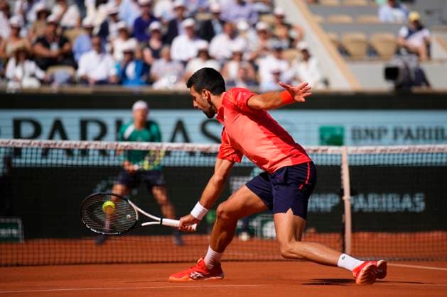 PARIS, FRANCE - JUNE 2: Novak Djokovic plays a backhand volley during the 3nd round of Roland Garros 2023 match on June 02, 2023, at Roland Garros Stadium in Paris, France. (Photo by Glenn Gervot Icon Sportswire) TENNIS: JUN 02 French Open EDITORIAL USE ONLY Icon2306024045