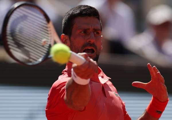 (230603) -- PARIS, June 3, 2023 -- Novak Djokovic of Serbia hits a return during the men s singles third round match between Novak Djokovic of Serbia and Alejandro Davidovich Fokina of Spain at the French Open tennis tournament at Roland Garros in Paris, France, on June 2, 2023. ) (SP)FRANCE-PARIS-TENNIS-ROLAND GARROS-FRENCH OPEN GaoxJing 