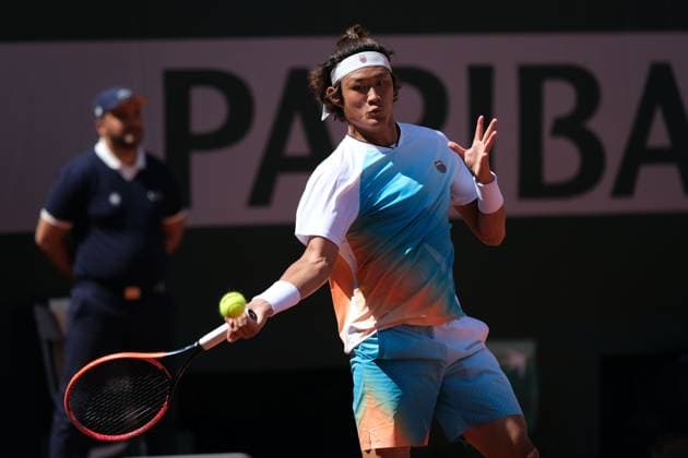 June 3, 2023, Paris, Paris, France: ZHIZHEN ZHAN of China return the ball to CASPER RUUD of Norway during the Day 7.of the French Open 2023, Grand Slam tennis tournament at the Roland-Garros Stadium - Paris France Paris France - ZUMAp119 20230603_zaf_p119_007 Copyright: xPierrexSteveninx