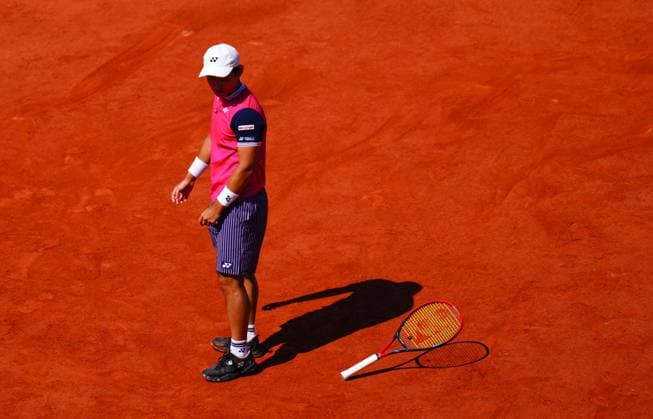 Mandatory Credit: Photo by Javier Garcia Shutterstock (13944030aj) Yoshihito Nishioka drops his racquet French Open Tennis, Day 7, Roland Garros, Paris, France - 03 June 2023 French Open Tennis, Day 7, Roland Garros, Paris, France - 03 June 2023  Copyright: xJavierxGarcia Shutterstockx 13944030aj