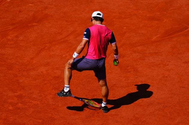 Mandatory Credit: Photo by Javier Garcia Shutterstock (13944030ak) Yoshihito Nishioka picks up his racquet with his feet after throwing it onto the ground French Open Tennis, Day 7, Roland Garros, Paris, France - 03 June 2023 French Open Tennis, Day 7, Roland Garros, Paris, France - 03 June 2023  Copyright: xJavierxGarcia Shutterstockx 13944030ak