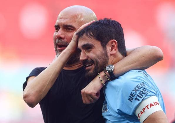 Sport Themen der Woche KW22 Sport Bilder des Tages Mandatory Credit: Photo by Kieran McManus Shutterstock (13944016dr) Manchester City Manager Pep Guardiola appears to cry as he celebrates with Ilkay Gündogan of Manchester City (8) at full-time Manchester City v Manchester United, ManU Emirates FA Cup, Final, Football, Wembley Stadium, London, UK - 03 June 2023 EDITORIAL USE ONLY No use with unauthorised audio, video, data, fixture lists, club league logos or live services. Online in-match use limited to 120 images, no video emulation. No use in betting, games or single club league player publications. Manchester City v Manchester United, Emirates FA Cup, Final, Football, Wembley Stadium, London, UK - 03 June 2023 EDITORIAL USE ONLY No use with unauthorised audio, video, data, fixture lists, club league logos or live services. Online in-match use limited to 120 images, no video emulation. No use in betting, games or single club league player publications.  Copyright: xKieranxMcManus Shutterstockx 13944016dr