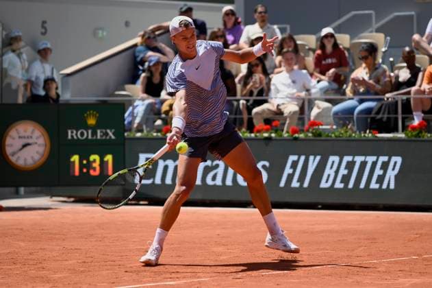 (230604) -- PARIS, June 4, 2023 -- Holger Rune of Denmark hits a return during the men s singles third round match between Holger Rune of Denmark and Genaro Alberto Olivieri of Argentina at the French Open tennis tournament at Roland Garros in Paris, France, on June 3, 2023. (Photo by Xinhua) (SP)FRANCE-PARIS-TENNIS-ROLAND GARROS-FRENCH OPEN JulienxMattia 