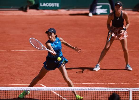 (230604) -- PARIS, June 4, 2023 -- Zhang Shuai (L) of China Kristina Mladenovic of France compete during the women s doubles second round match against Wang Xinyu of China Hsieh Su-Wei of Chinese Taipei at the French Open tennis tournament at Roland Garros in Paris, France, June 4, 2023. ) (SP)FRANCE-PARIS-TENNIS-ROLAND GARROS-FRENCH OPEN-WOMEN S DOUBLES GaoxJing 