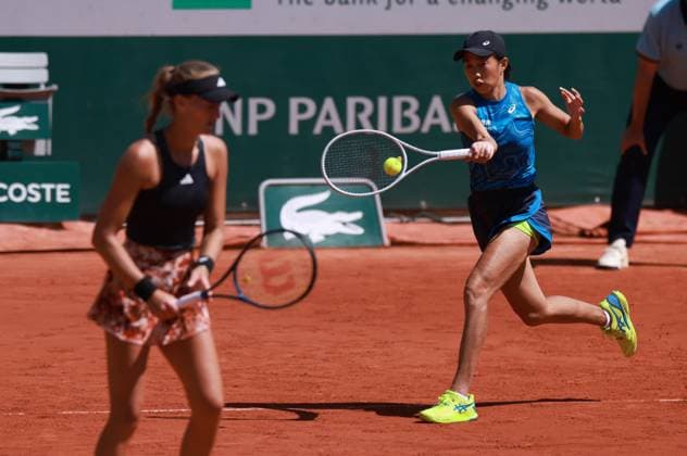 (230604) -- PARIS, June 4, 2023 -- Zhang Shuai (R) of China Kristina Mladenovic of France compete during the women s doubles second round match against Wang Xinyu of China Hsieh Su-Wei of Chinese Taipei at the French Open tennis tournament at Roland Garros in Paris, France, June 4, 2023. ) (SP)FRANCE-PARIS-TENNIS-ROLAND GARROS-FRENCH OPEN-WOMEN S DOUBLES GaoxJing 
