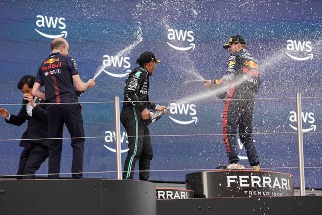 04 06 2023, Circuit de Catalunya, Barcelona, Formula 1 AWS Grand Prix of Spain 2023 , in picture podium winner Max Verstappen NLD , Oracle Red Bull Racing, 2nd place for Lewis Hamilton GBR , Mercedes AMG Petronas Formula One Team, engine engineer David Mart Red Bull Racing , FIA president Mohammed bin Sulayem flees from the champagne shower Barcelona Circuit de Catalunya Catalunya Spain  eu-images-506