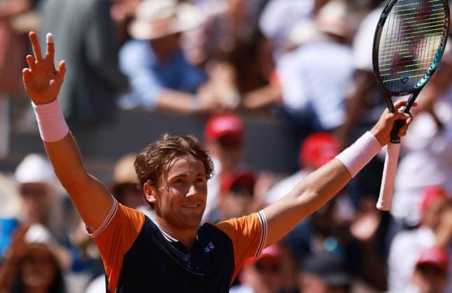 (230606) -- PARIS, June 6, 2023 -- Casper Ruud celebrates after winning the men s singles fourth round match between Casper Ruud of Norway and Nicolas Jarry of Chile at the French Open tennis tournament at Roland Garros in Paris, France, on June 5, 2023. ) (SP)FRANCE-PARIS-TENNIS-ROLAND GARROS-FRENCH OPEN-MEN S SINGLES GaoxJing 