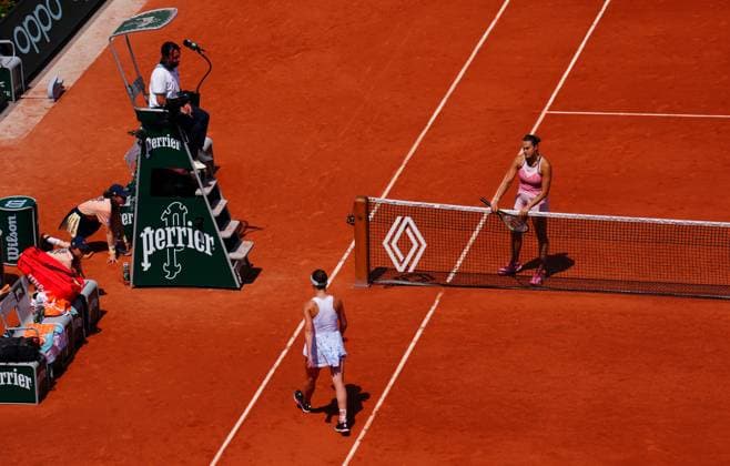 Mandatory Credit: Photo by Javier Garcia Shutterstock (13949267x) Aryna Sabalenka waits in vain at the net as Elina Svitolina walks straight off following her defeat in their quarter final French Open Tennis, Day 10, Roland Garros, Paris, France - 06 June 2023 French Open Tennis, Day 10, Roland Garros, Paris, France - 06 June 2023  Copyright: xJavierxGarcia Shutterstockx 13949267x