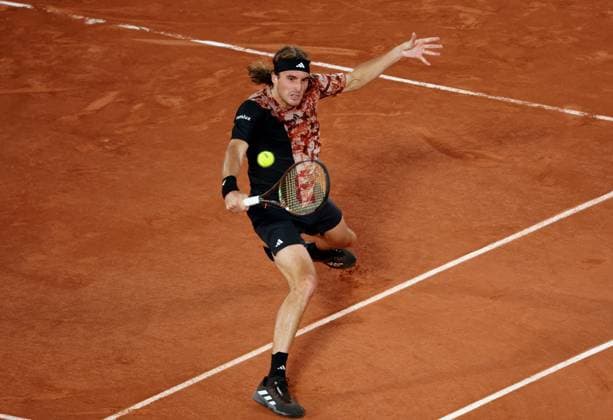 Fifth-seeded Stefanos Tsitsipas of Greece plays against top-seeded Carlos Alcaraz of Spain at the Roland Garros French Tennis Open in Paris, France, on Tuesday, June 6, 2023. Alcaraz won 6-2, 6-1, 7-6 and qualified for the semi finals.  PAR20230606135 MAYAxVIDON-WHITE
