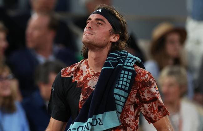 (230607) -- PARIS, June 7, 2023 -- Stefanos Tsitsipas reacts during the men s singles quarterfinal match between Carlos Alcaraz of Spain and Stefanos Tsitsipas of Greece at the French Open tennis tournament at Roland Garros in Paris, France, on June 6, 2023. ) (SP)FRANCE-PARIS-TENNIS-ROLAND GARROS-FRENCH OPEN-MEN S SINGLES GaoxJing 