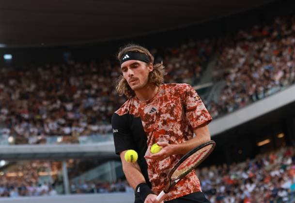 (230607) -- PARIS, June 7, 2023 -- Stefanos Tsitsipas competes during the men s singles quarterfinal match between Carlos Alcaraz of Spain and Stefanos Tsitsipas of Greece at the French Open tennis tournament at Roland Garros in Paris, France, on June 6, 2023. ) (SP)FRANCE-PARIS-TENNIS-ROLAND GARROS-FRENCH OPEN-MEN S SINGLES GaoxJing 