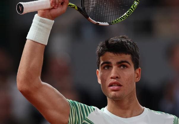 (230607) -- PARIS, June 7, 2023 -- Carlos Alcaraz reacts during the men s singles quarterfinal match between Carlos Alcaraz of Spain and Stefanos Tsitsipas of Greece at the French Open tennis tournament at Roland Garros in Paris, France, on June 6, 2023. ) (SP)FRANCE-PARIS-TENNIS-ROLAND GARROS-FRENCH OPEN-MEN S SINGLES GaoxJing 