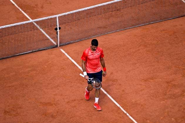 (230607) -- PARIS, June 7, 2023 -- Novak Djokovic reacts during the men s singles quarterfinal match between Novak Djokovic of Serbia and Karen Khachanov of Russia at the French Open tennis tournament at Roland Garros in Paris, France, on June 6, 2023. (Photo by Xinhua) (SP)FRANCE-PARIS-TENNIS-ROLAND GARROS-FRENCH OPEN-MEN S SINGLES JulienxMattia 